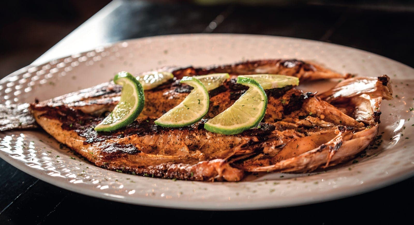 Trucha a la plancha aromatizada con romero